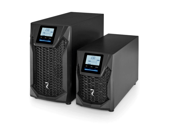 Whitney leaning against a railing on a downtown street